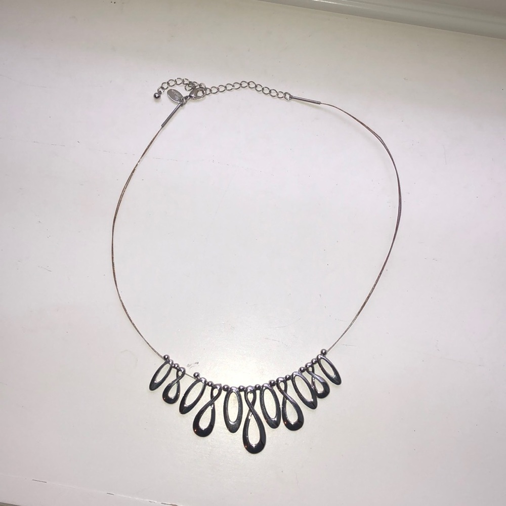 A silver beaded necklace